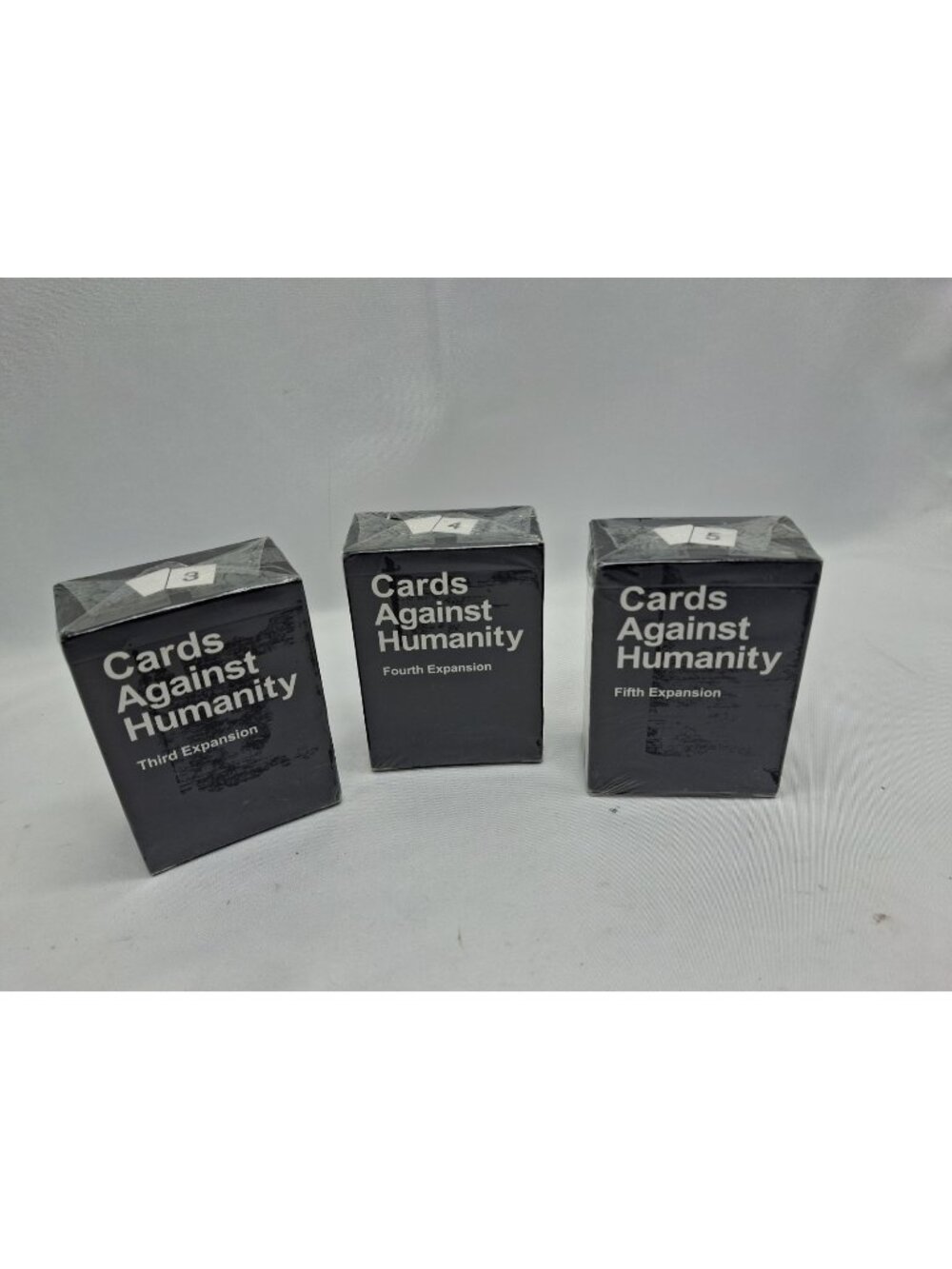 Cards Against Humanity Expansion Packs 3, 4, 5 New & Sealed.